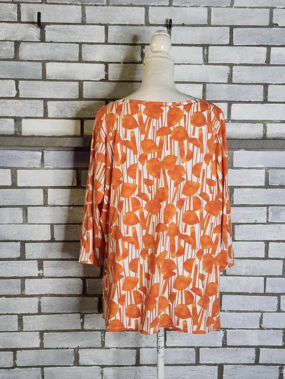 Belle by Kim Gravel features boatneck
